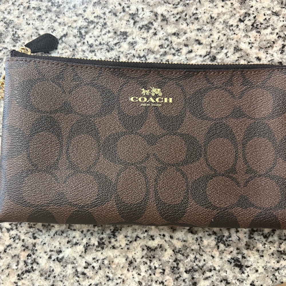 Medium Black and Brown Coach Clutch